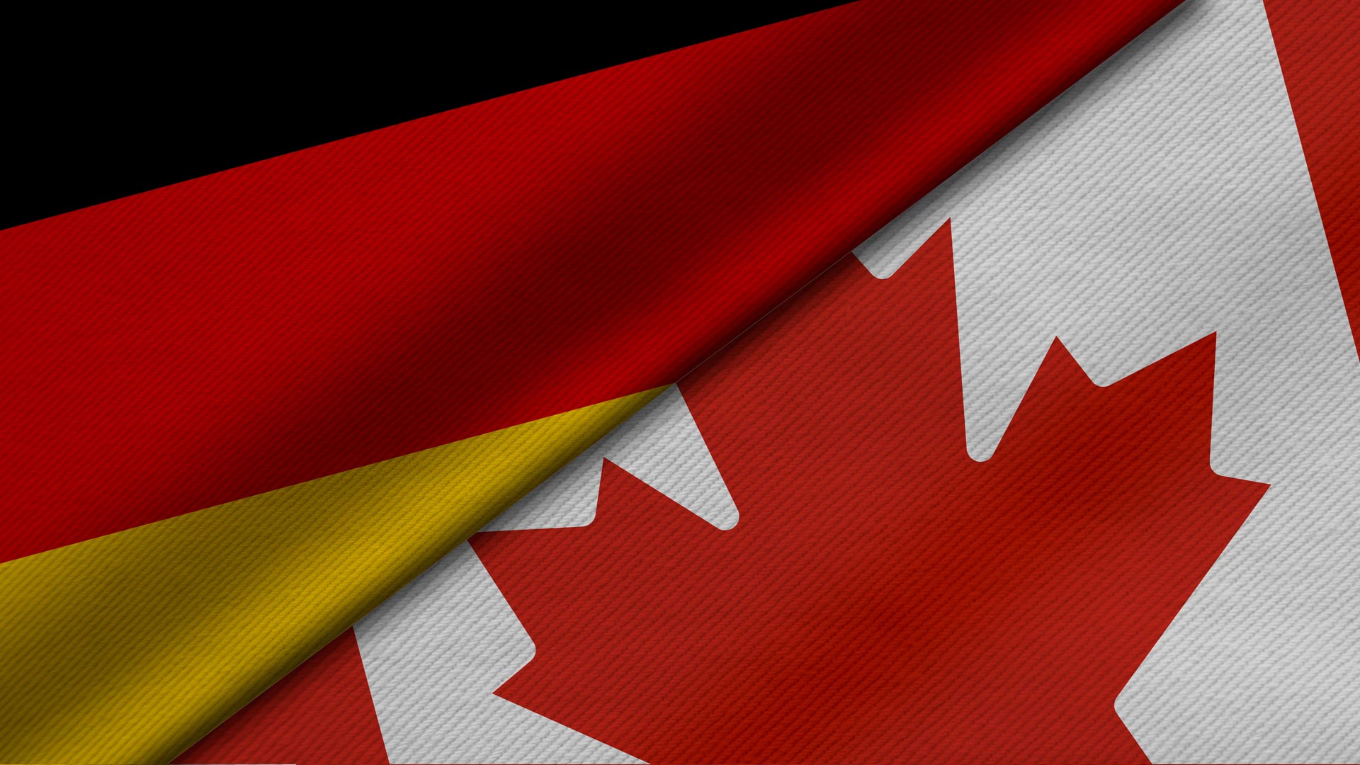 Seltene Erden: Deutschland und Kanada schließen Rohstoff-Partnerschaft Seltene Erden: Deutschland und Kanada schließen Rohstoff-Partnerschaft – Flaggen von Deutschland und Kanada